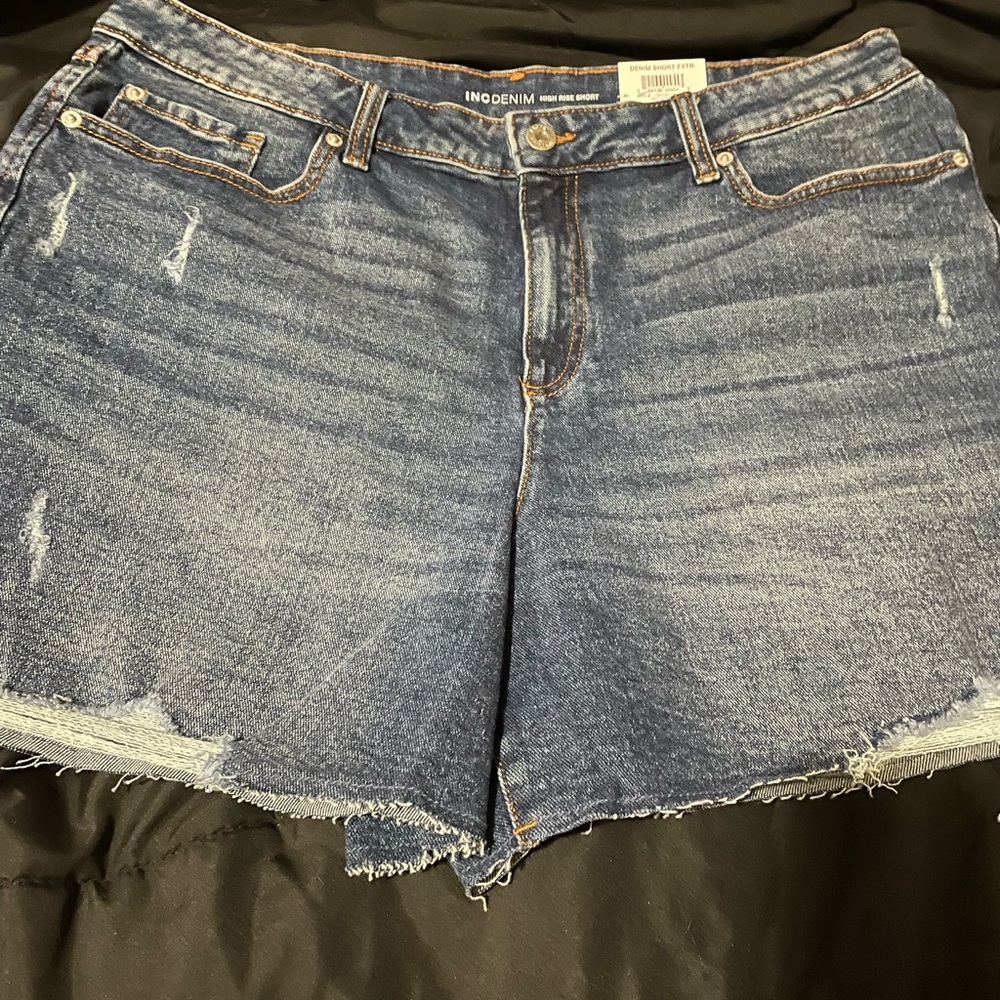 INC International Concepts women’s deconstructed, frayed denim shorts